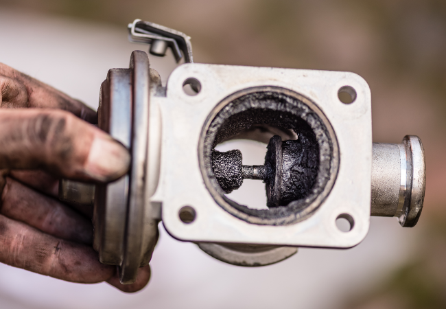 Carbon-clogged EGR valve before cleaning